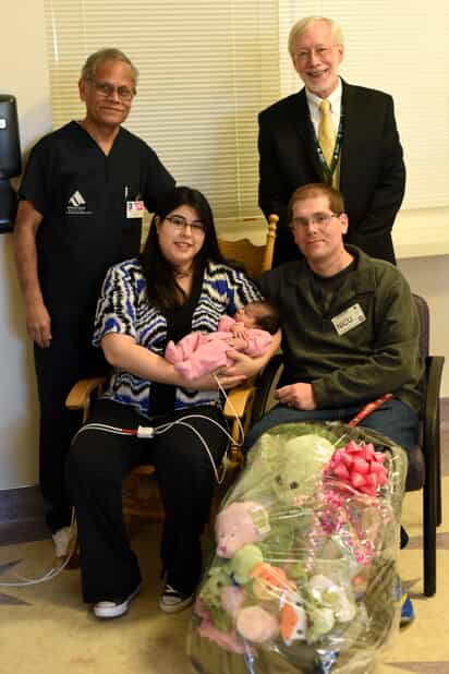 New parents with newborn baby